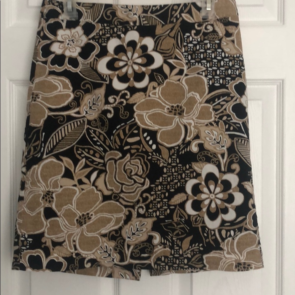 Tan, black and white patterned skirt